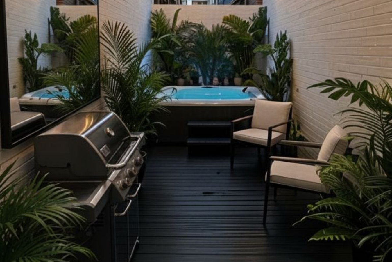 Hastings House courtyard decking with hot tub